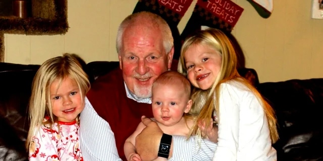 grandpa with 3 grandchildren
